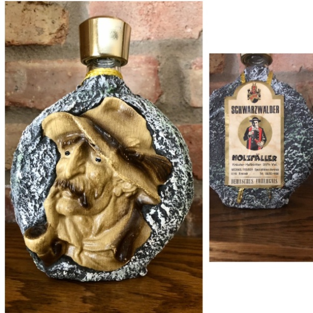 Vintage collectible bottle with a lumberjack face